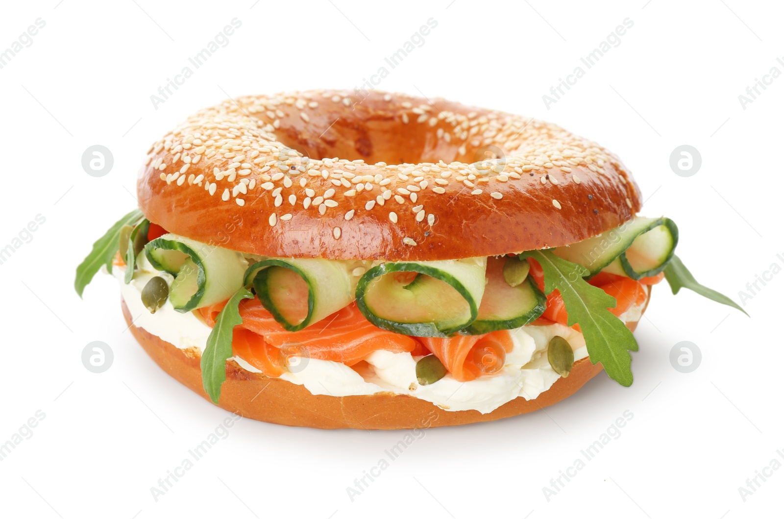 Photo of Delicious bagel with salmon, cream cheese and cucumber isolated on white