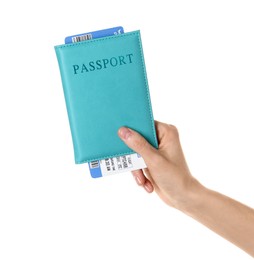 Photo of Woman holding passport with ticket on white background, closeup