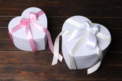 Photo of Two beautiful wedding gifts on wooden table