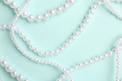 Photo of Stylish accessories on light blue background, flat lay