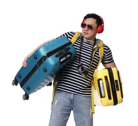 Photo of Traveller carrying heavy suitcases on white background