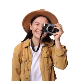 Photo of Happy traveller taking photo on white background