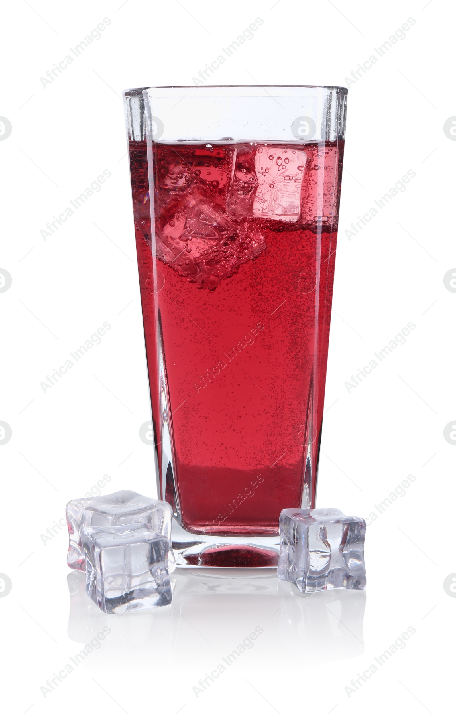 Photo of Sweet soda water in glass and ice cubes isolated on white