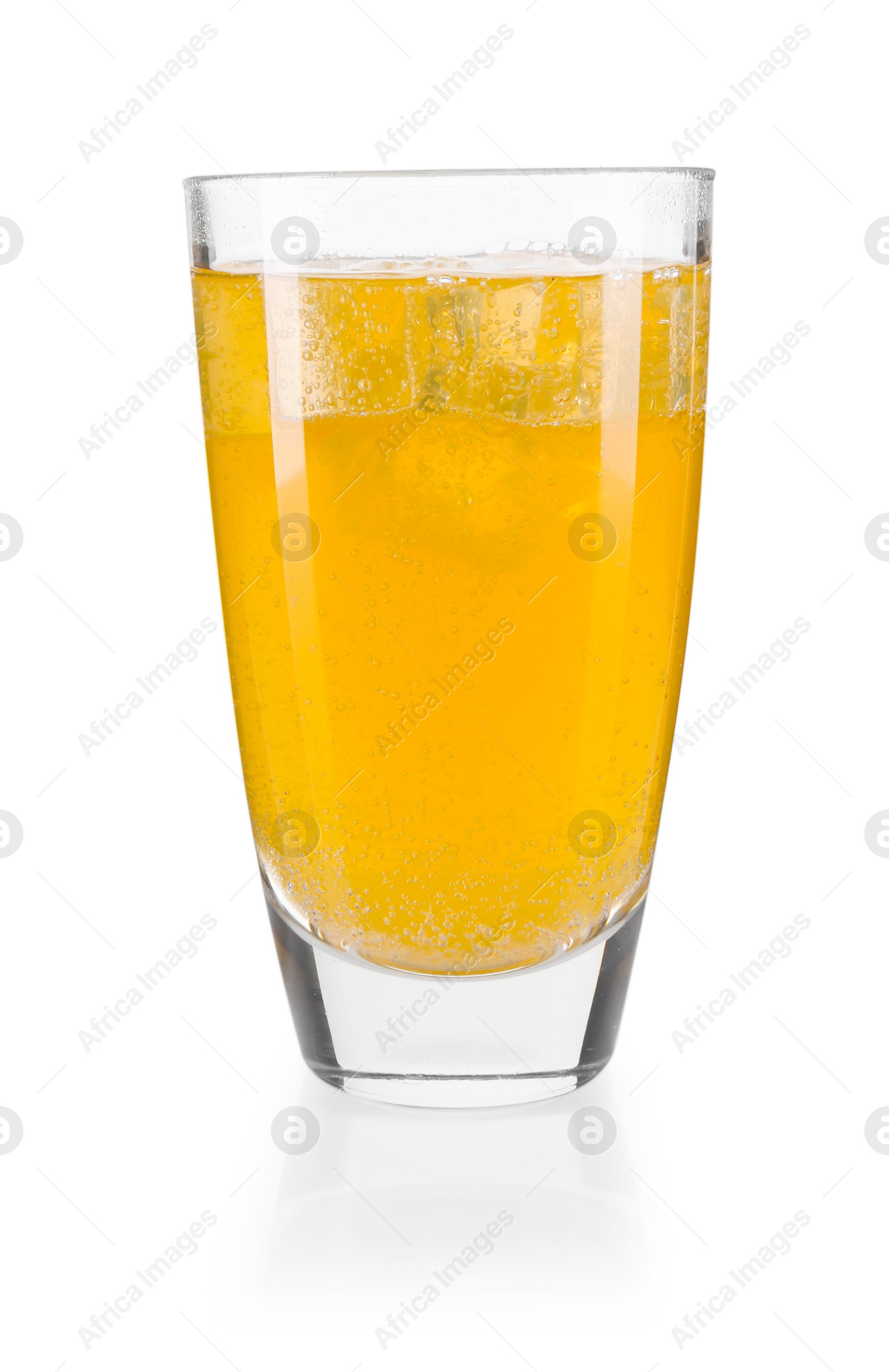 Photo of Sweet soda water with ice cubes in glass isolated on white