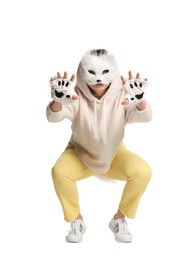 Photo of Quadrobics. Woman wearing cat mask and gloves on white background