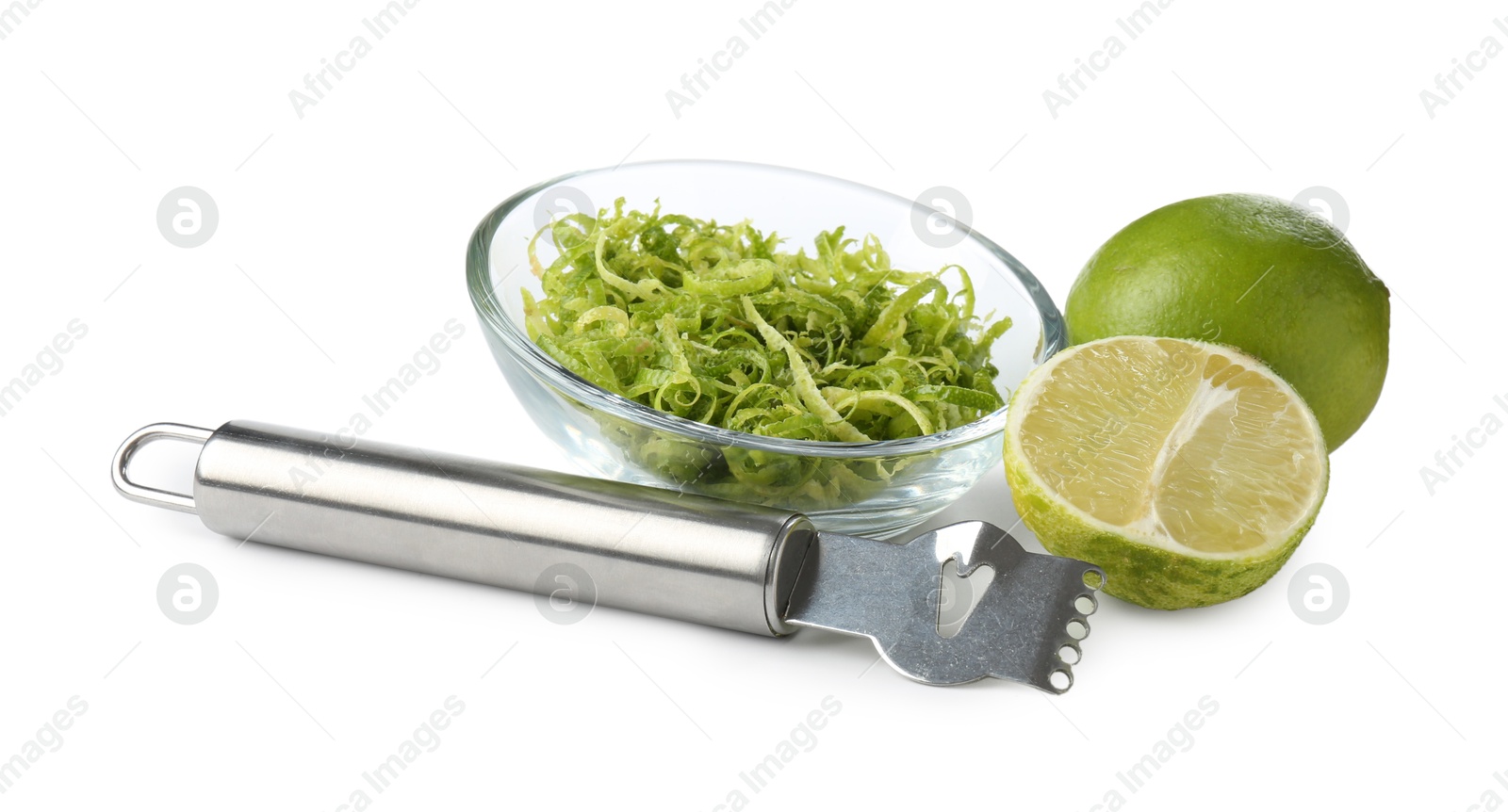 Photo of Lime zest, fresh fruits and zester tool isolated on white