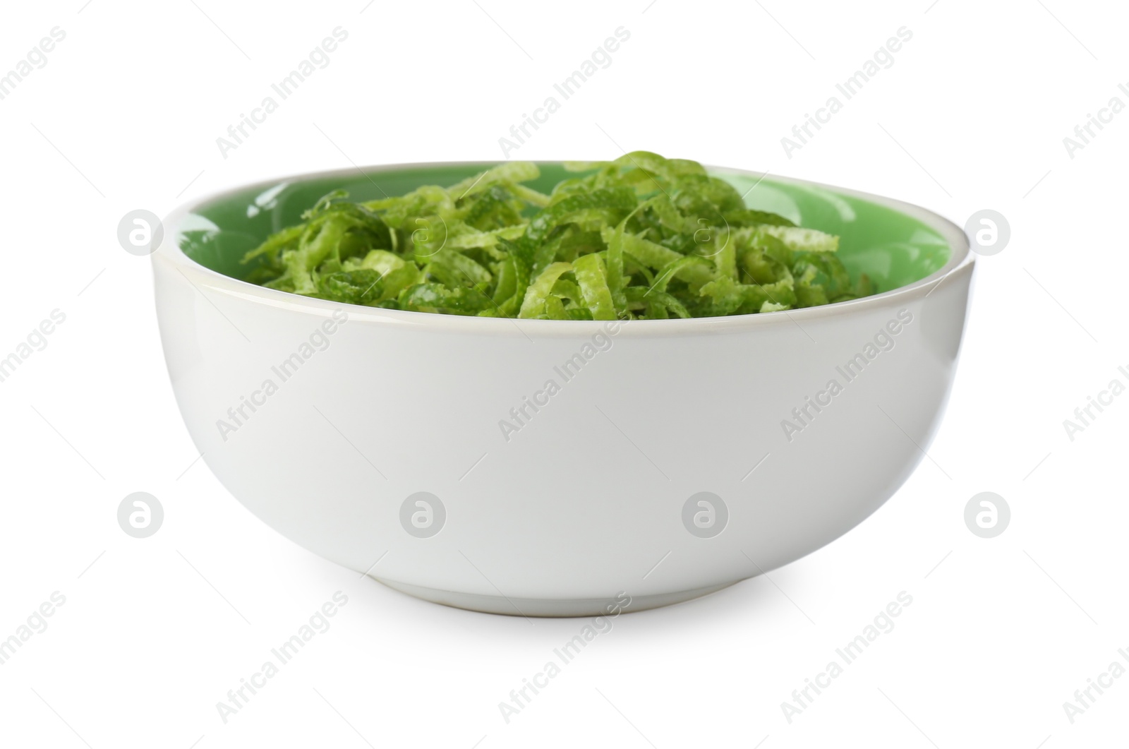 Photo of Fresh lime zest in bowl isolated on white