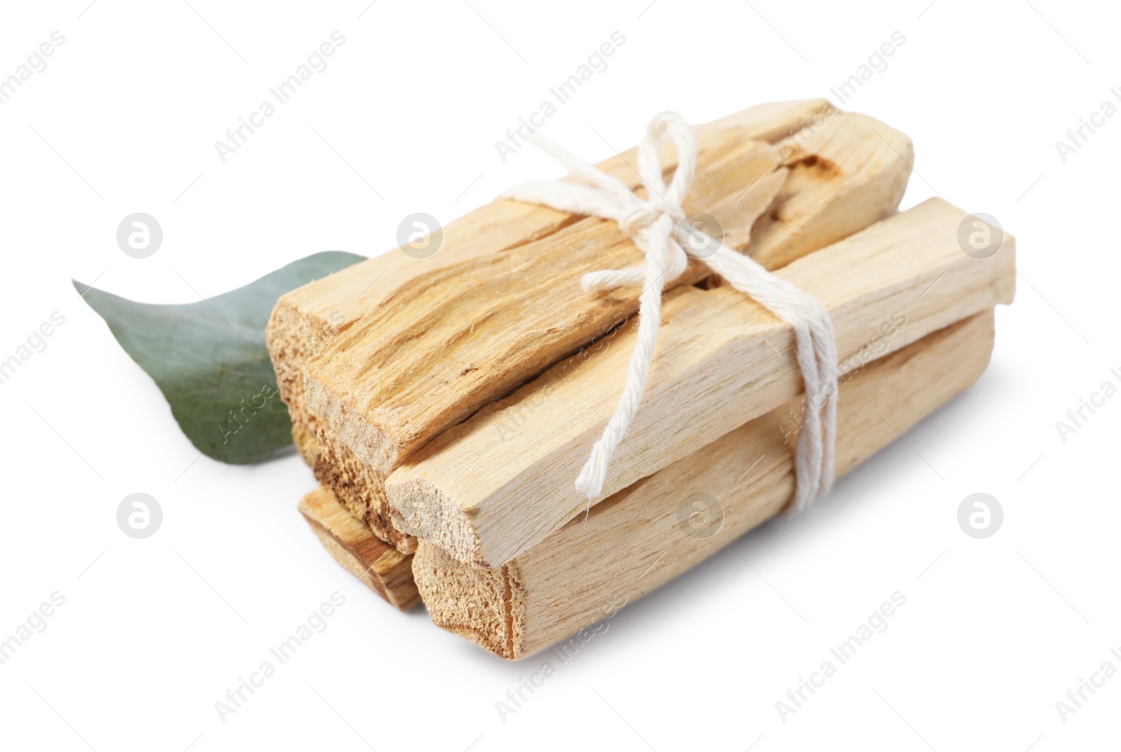 Photo of Palo santo sticks and eucalyptus leaf isolated on white