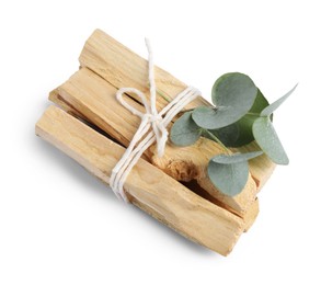 Photo of Palo santo sticks and eucalyptus branches isolated on white, top view