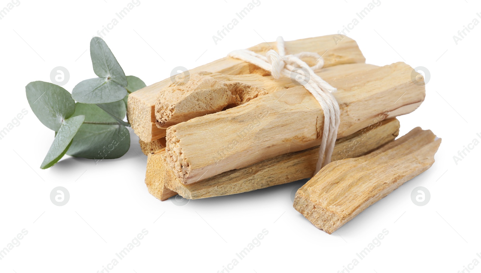 Photo of Palo santo sticks and eucalyptus branches isolated on white