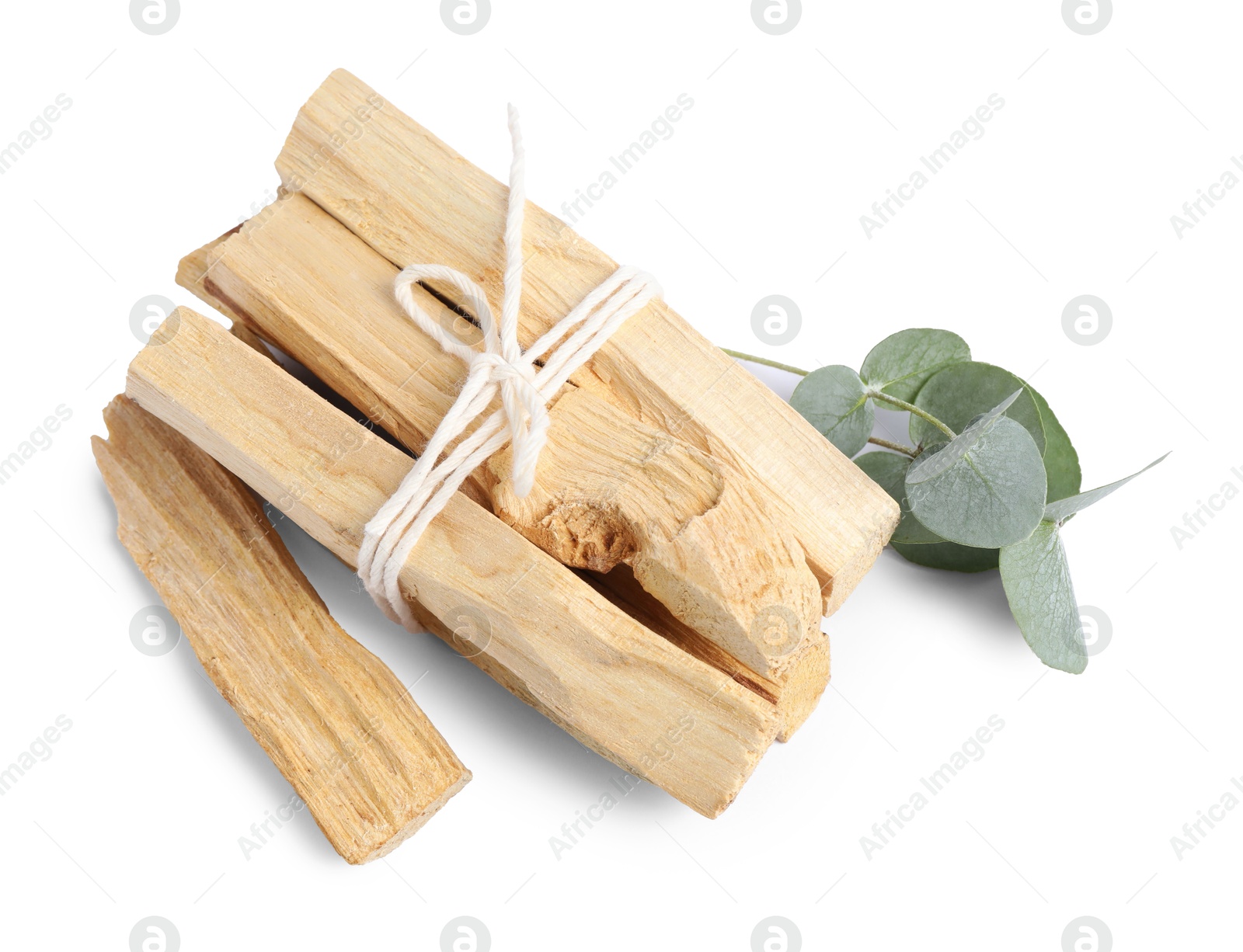 Photo of Palo santo sticks and eucalyptus branches isolated on white, top view