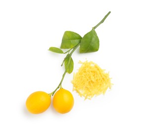 Photo of Fresh lemon zest and branch with fruits isolated on white, top view