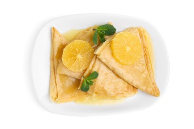 Photo of Delicious Crepes Suzette dessert isolated on white, top view