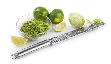 Photo of Lime zest, grater and fresh fruits isolated on white