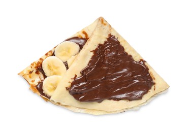 Delicious crepe with chocolate sauce and banana isolated on white, top view