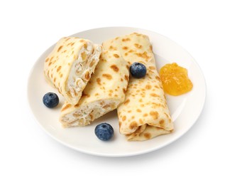 Photo of Delicious crepes with cottage cheese, jam and blueberries isolated on white