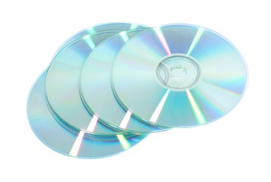 Photo of Many shiny compact discs isolated on white