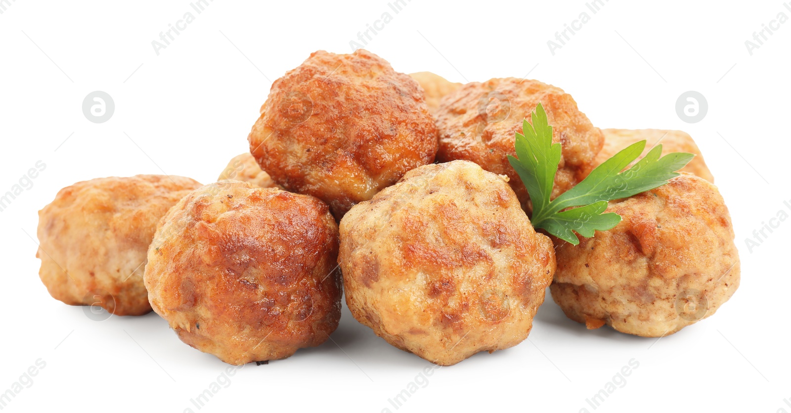 Photo of Pile of delicious meatballs and parsley isolated on white