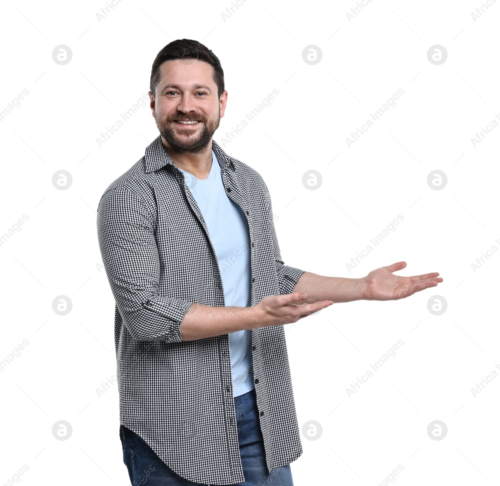 Photo of Happy man welcoming friends or guests on white background