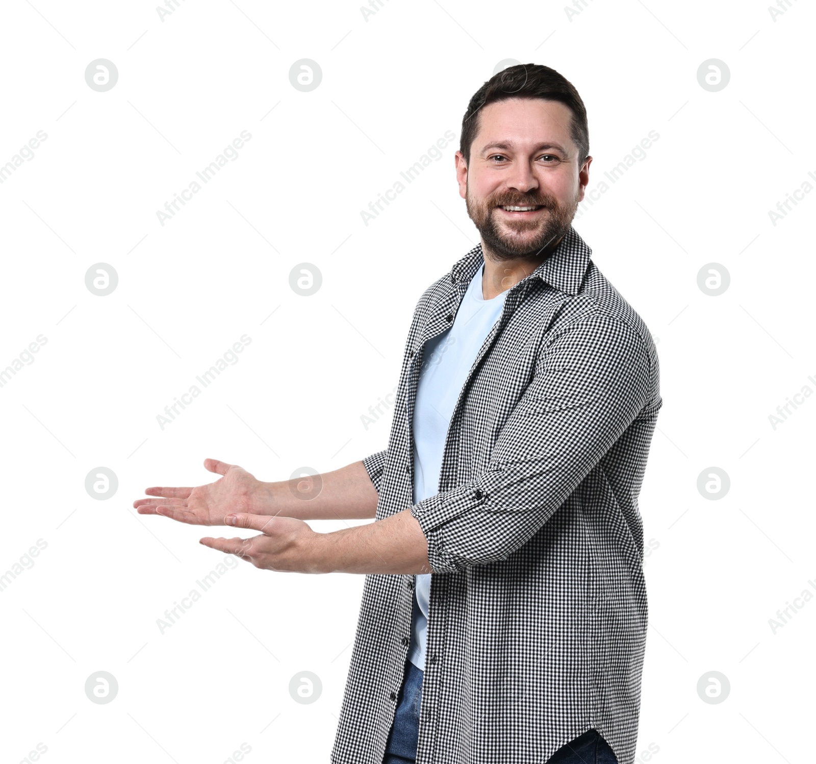 Photo of Happy man welcoming friends or guests on white background