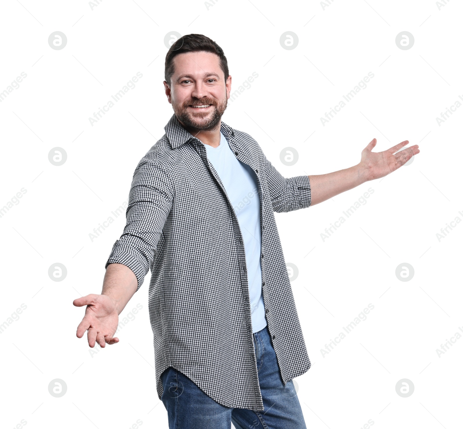 Photo of Happy man welcoming friends or guests on white background