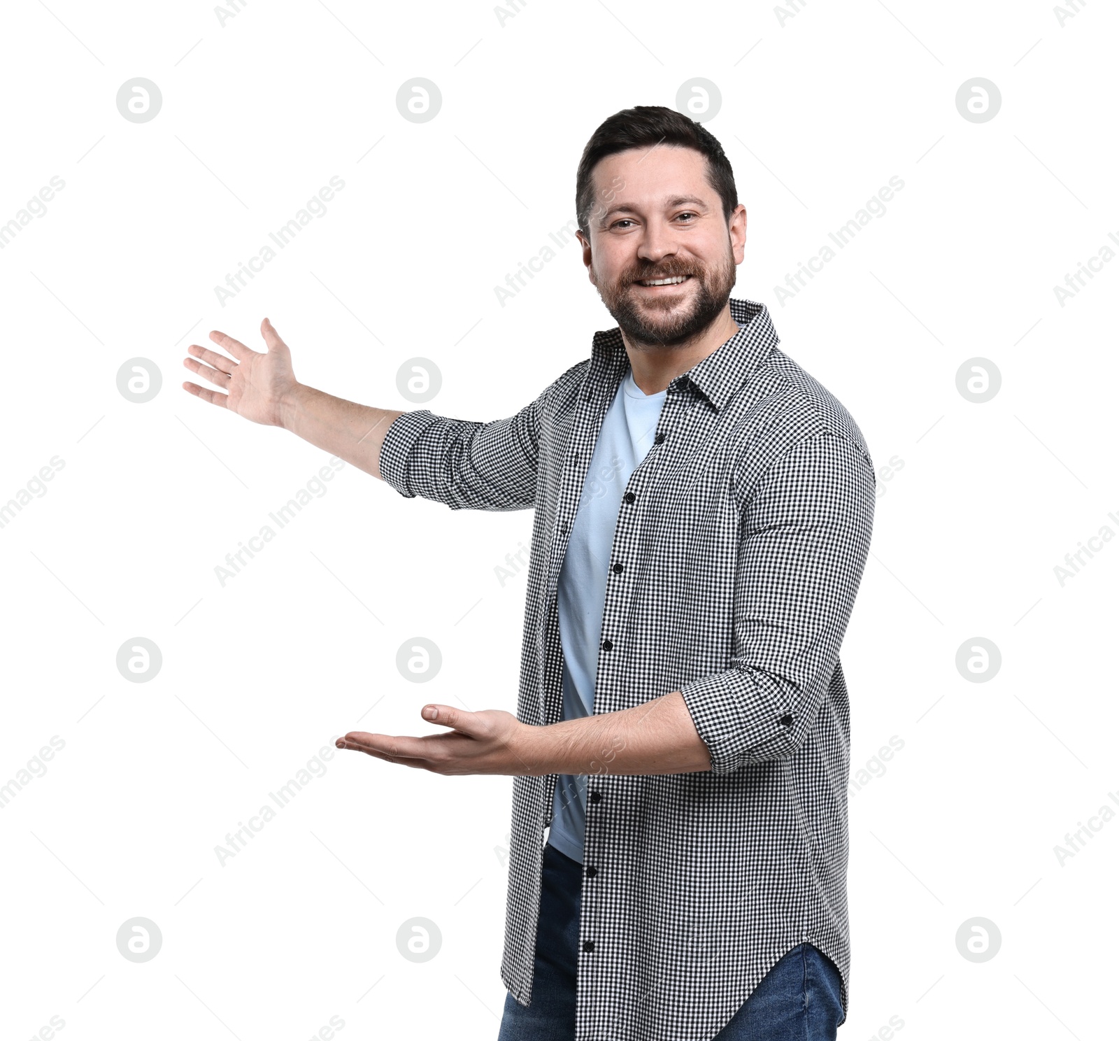 Photo of Happy man welcoming friends or guests on white background