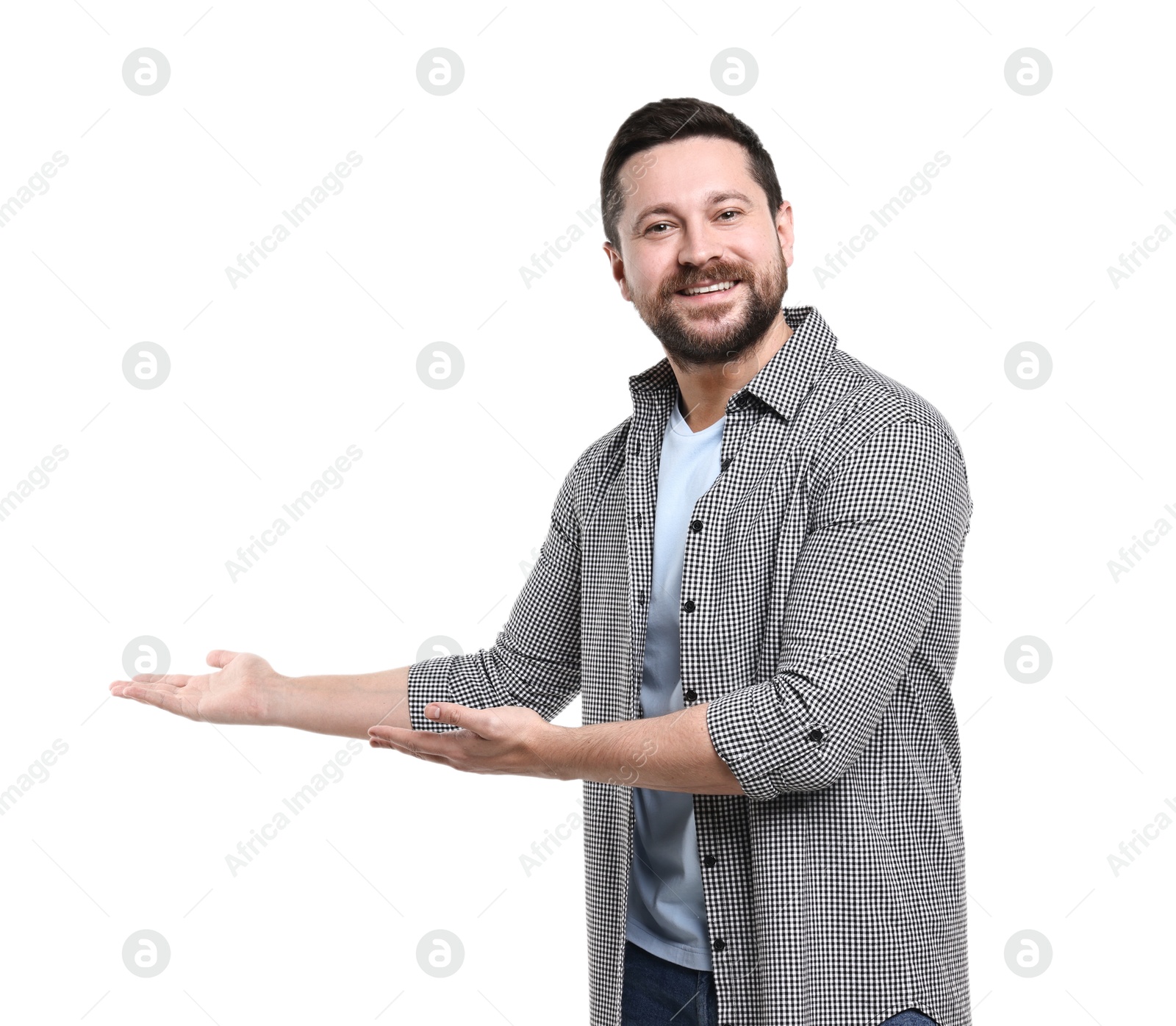 Photo of Happy man welcoming friends or guests on white background