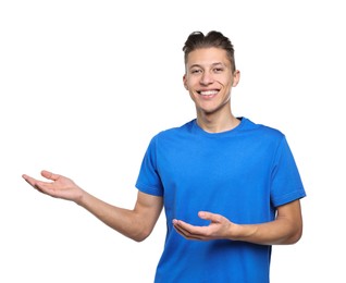 Photo of Happy man welcoming friends or guests on white background