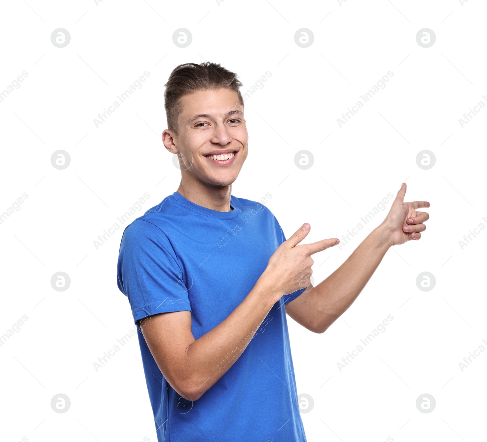 Photo of Happy man welcoming friends or guests on white background