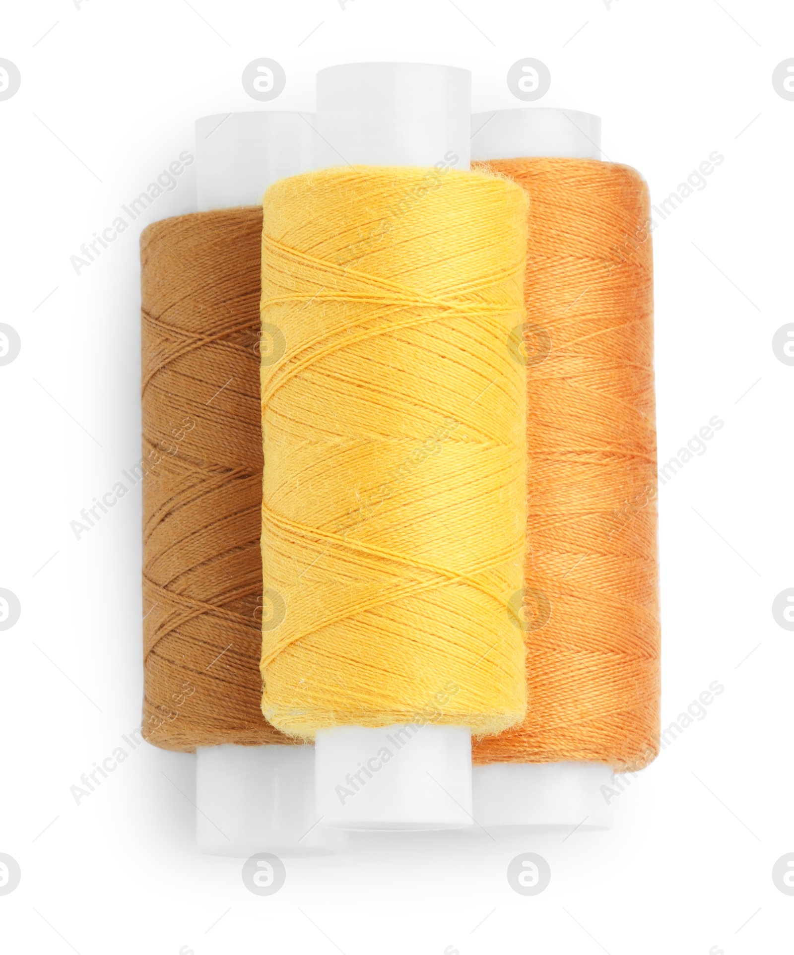 Photo of Spools of bright sewing threads isolated on white, top view