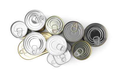 Photo of Many closed tin cans isolated on white, top view