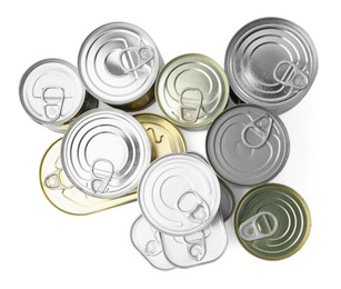 Photo of Many closed tin cans isolated on white, top view