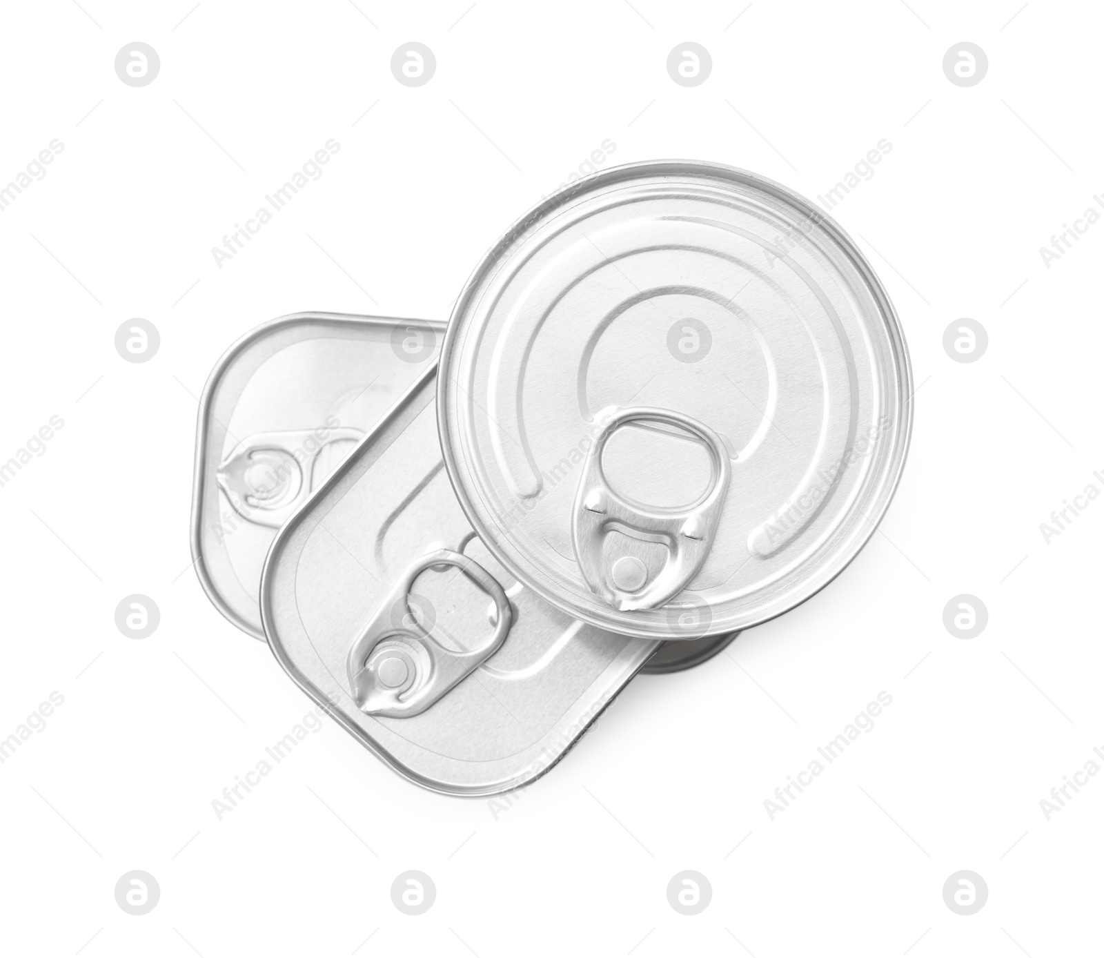 Photo of Many closed tin cans isolated on white, top view