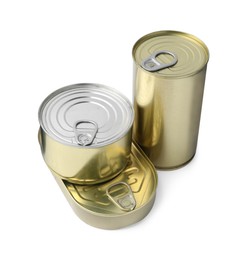 Photo of Many closed tin cans isolated on white