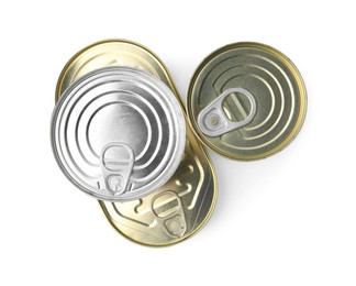 Photo of Many closed tin cans isolated on white, top view