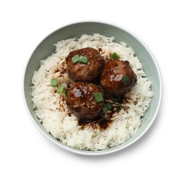 Photo of Delicious rice with meatballs, sauce and green onions in bowl isolated on white, top view