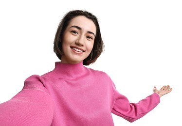 Photo of Cheerful woman welcoming friends or guests via video call on white background