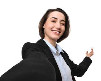 Photo of Happy businesswoman welcoming clients or partners via video call on white background