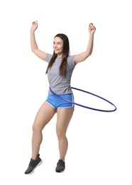 Photo of Smiling woman training with hula hoop on white background