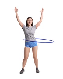 Photo of Smiling woman training with hula hoop on white background