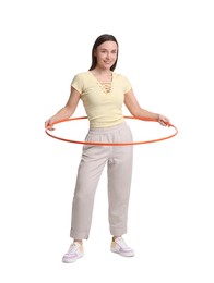 Photo of Smiling woman training with hula hoop on white background