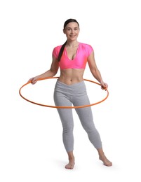 Photo of Smiling woman training with hula hoop on white background