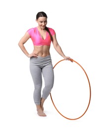 Photo of Smiling woman with hula hoop on white background