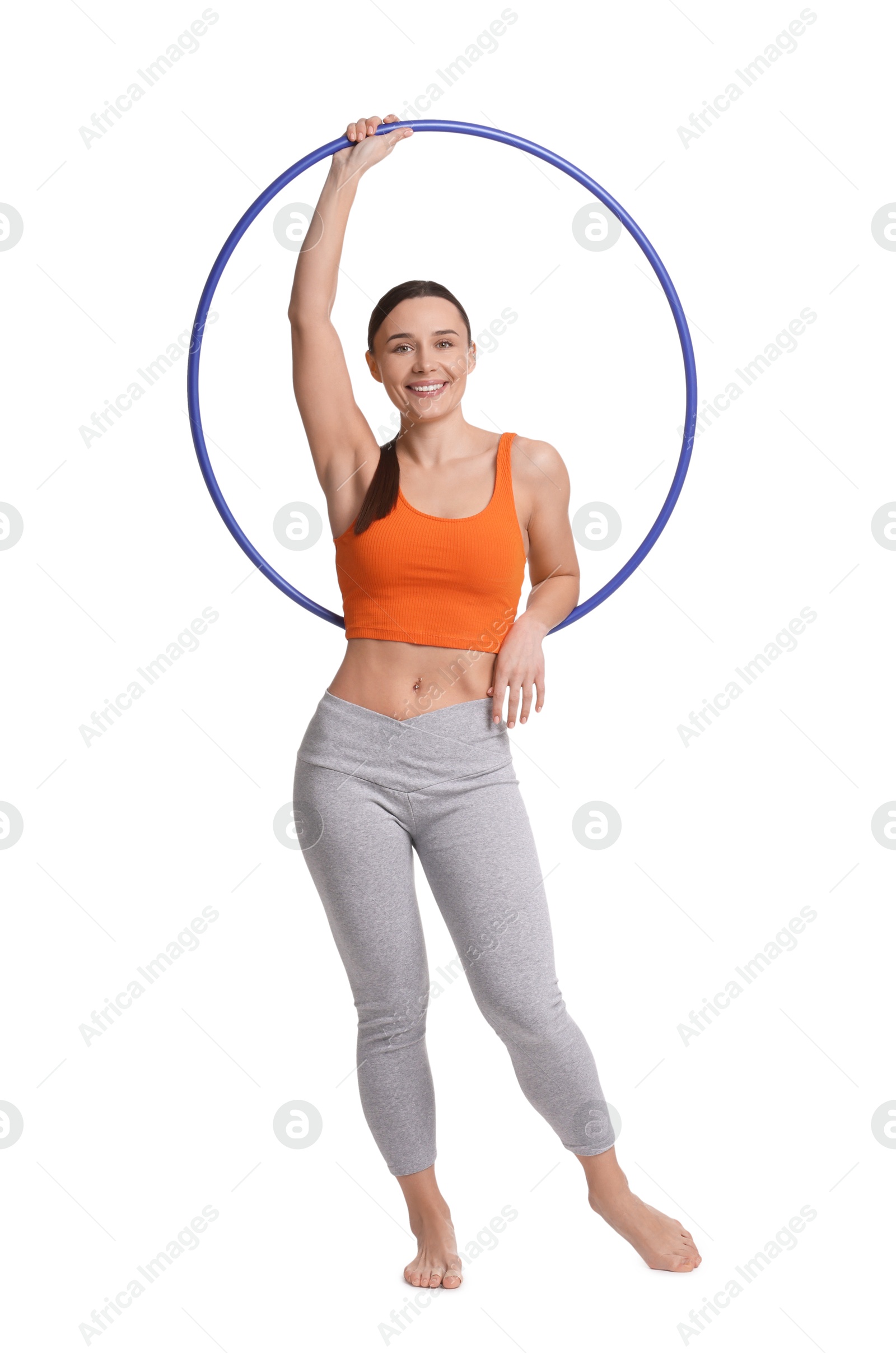 Photo of Smiling woman with hula hoop on white background