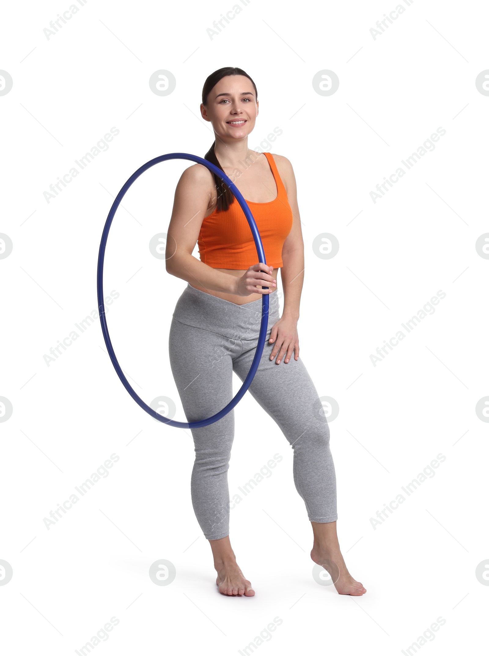 Photo of Smiling woman with hula hoop on white background