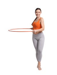 Photo of Smiling woman training with hula hoop on white background