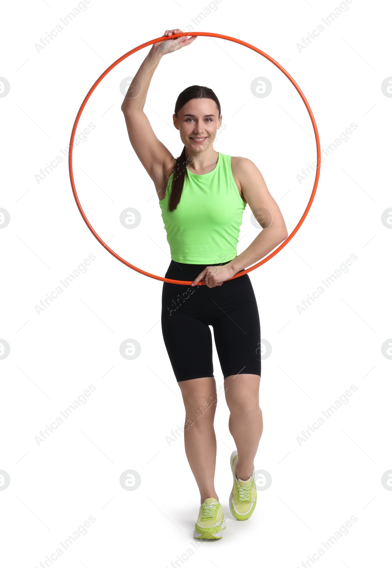 Photo of Smiling woman with hula hoop on white background