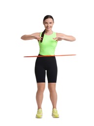 Photo of Smiling woman training with hula hoop on white background