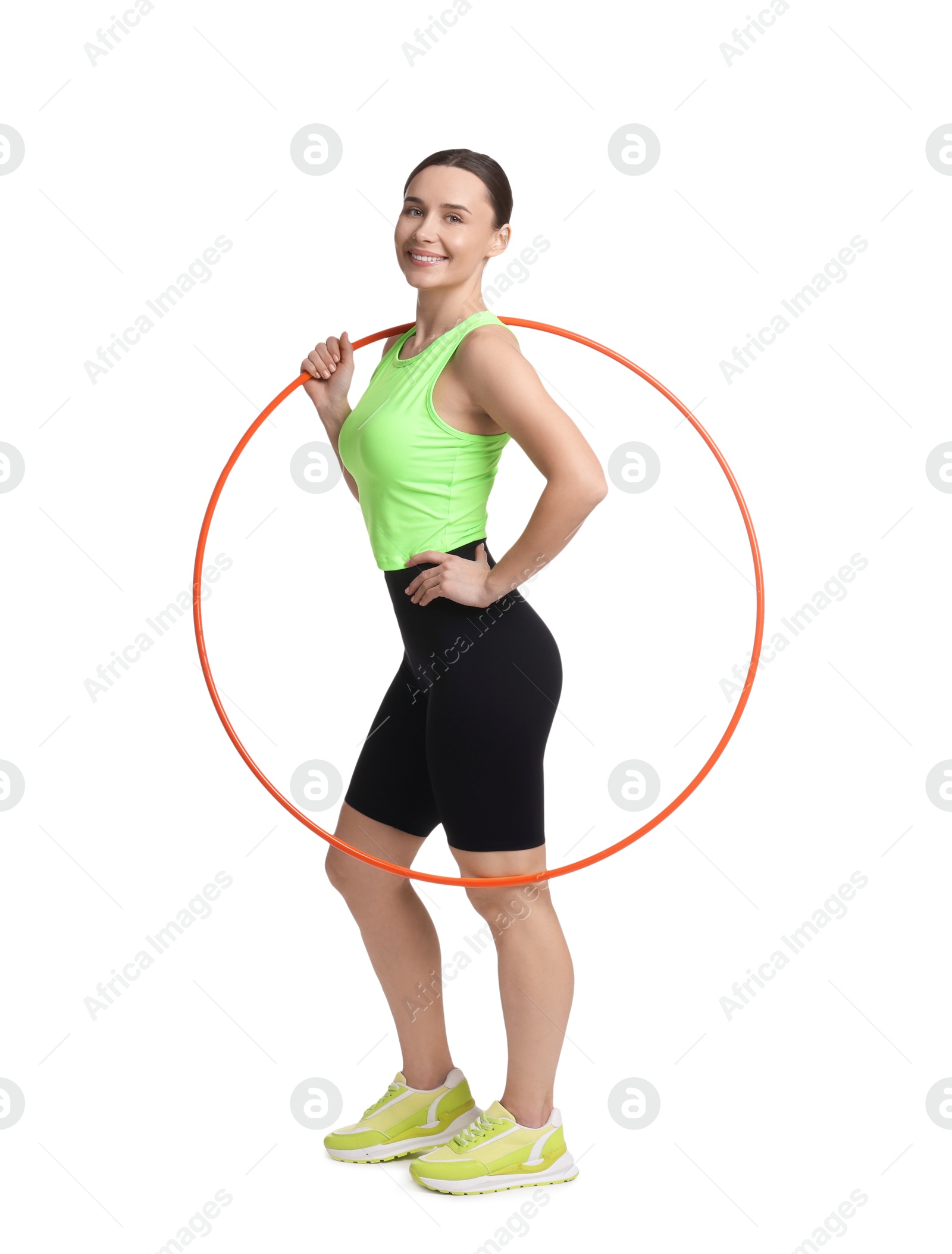 Photo of Smiling woman with hula hoop on white background