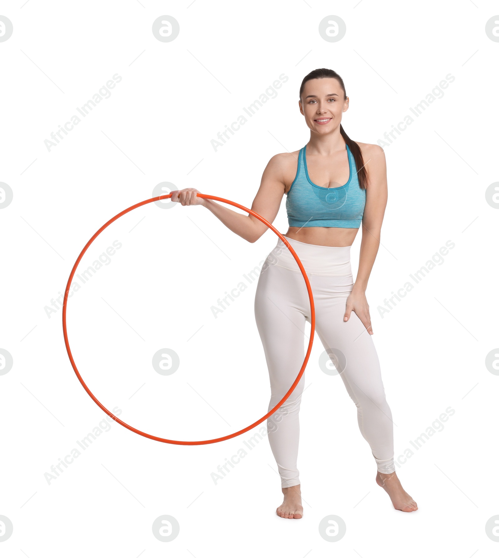 Photo of Smiling woman with hula hoop on white background